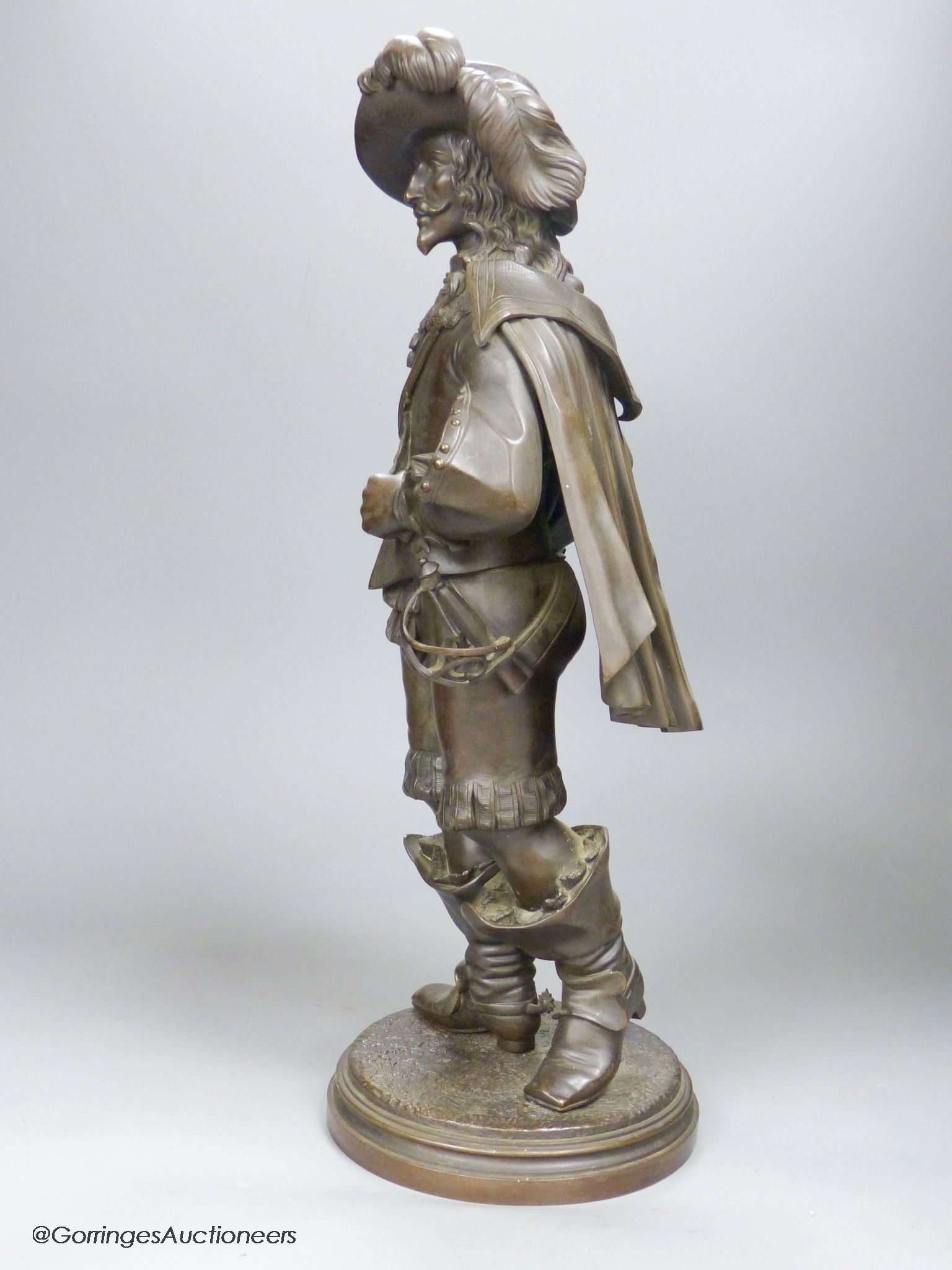 An early 20th century bronze figure of a cavalier, height 50cm